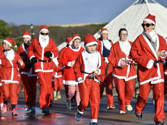 Runners take part in this year's Santa Dash