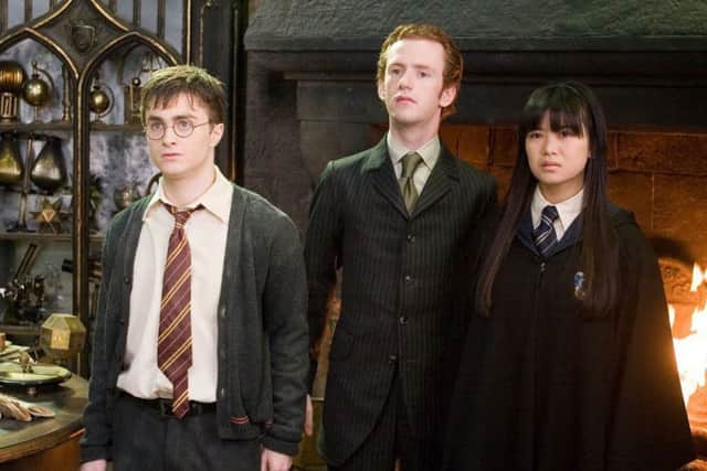 Chris Rankin stars in the Harry Potter movies with Daniel Radcliffe, left, as Harry Potter and Katie Leung as Cho Chang.