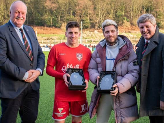 Michael Coulson and Dave Thompson with the awards, flanked by Trevor Bull and Andy Traughton. Picture by Morgan Exley