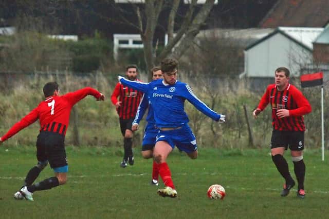 Hunmanby United's Tommy Wilson lets fly with an effort on the Pier goal