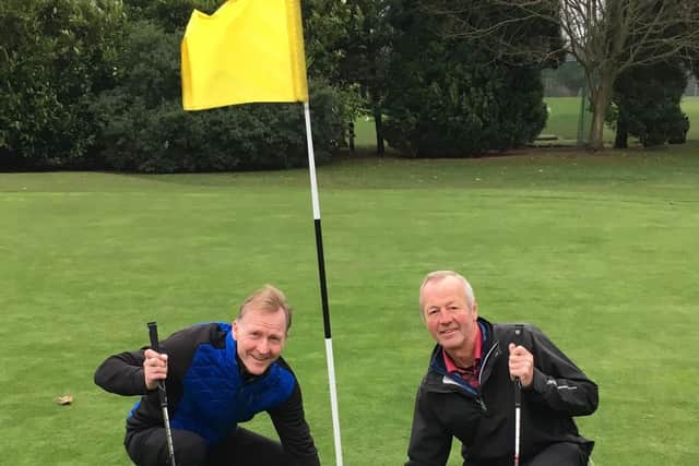 Jim Barr and Barry Noble celebrate their aces