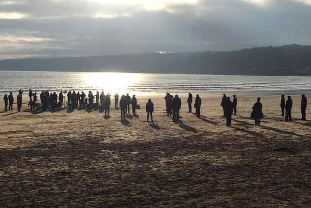 Filming on the beach this morning.