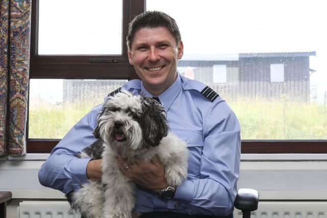 Wing Commander Al Walton, Station Commander RAF Fylingdales with Jasper.