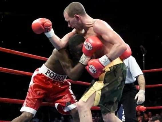 Paul Ingle has Junior Jones in trouble in their fight at Madison Square Gardens in New York. Ingle won the fight in April 2000 via an 11th round TKO. Picture: Getty Images.