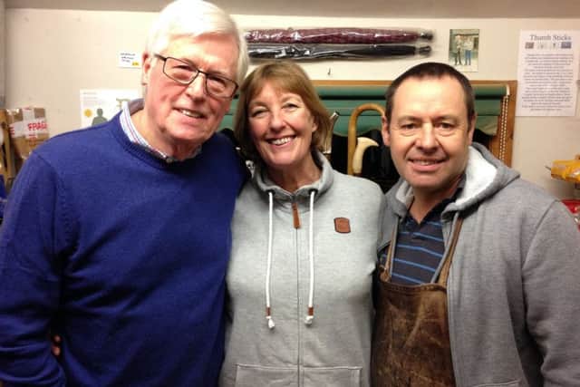 Keith and Jacky Pickering from The Stick Man with TV presenter John Craven.
