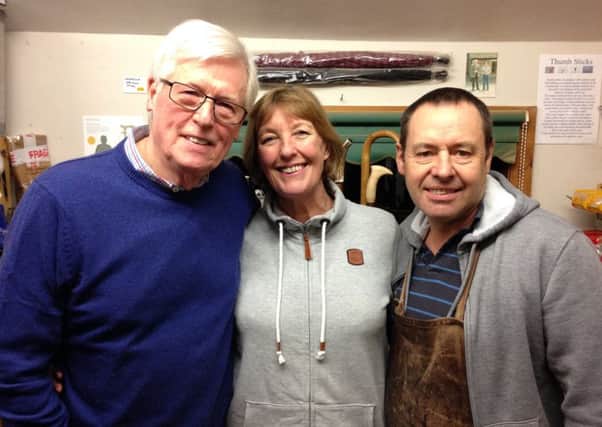 Keith and Jacky Pickering from The Stick Man with TV presenter John Craven.