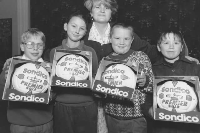In 1995, Madalyn Horner, Midland Bank Youth Marketing Officer, was pictured Filey Junior School pupils Michael Humphries, Dominique Shaw, Jonathan Burgess, and James Jenkinson, who designed and won a poster competition.