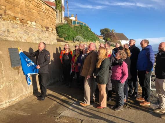 A plaque has been unveiled today at Runswick Bay
