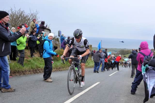 1May 2016....... The peloton makes its way up the Cote de Robin Hoods Bay on stage three of the Tour de Yorkshire from Middlesbrough to Scarborough. Picture Tony Johnson