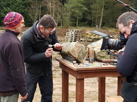 BBCs Matt Baker tries his hand at stone carving at Dalby Forests maze site