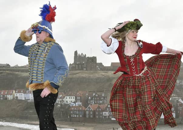 Steam Punks prepare for the big event in Whitby in a couple of weeks. Andy and Michelle Dolan on Whitby's windy West Cliff.