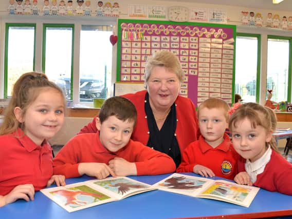 Mrs Croser is pictured with Filey Church of England Nursery and Infants Academy pupils, from left, Gracie-Beau Kennedy, 7; Ryan Sanderson, 7; James Deauville, 6; and Ida Watts, 5.