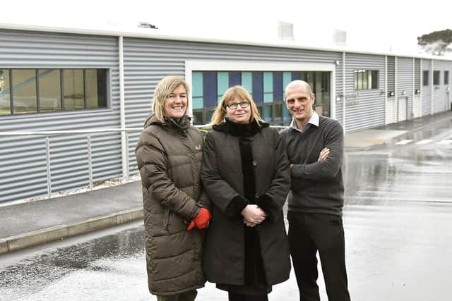 Funding Programme Officer Pip Betts, Principle Ann Hardy and Head of Automotive, Construction and Engineering Simon Gummerson outside the new building.