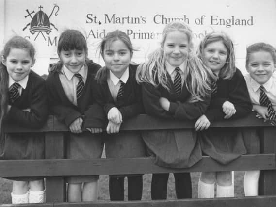 Pictured in 1993 are St Martin's C of E School pupils whose fundraising efforts collected 435 for the Blue Peter Appeal - from left, Laura Alexander, Sophie Bashall, Jill Adamson, Elizabeth Greenwood, Laura McGill, and Katy Swailes.
