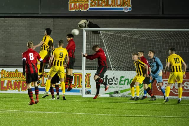 Aidan Thurston flicks on a corner
Pictures by Andy Standing