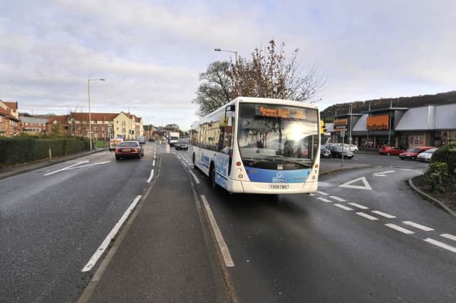 Seamer road bus stop near opposite the retail park causes problems with the single lane stopping point . pic Richard Ponter 175145a