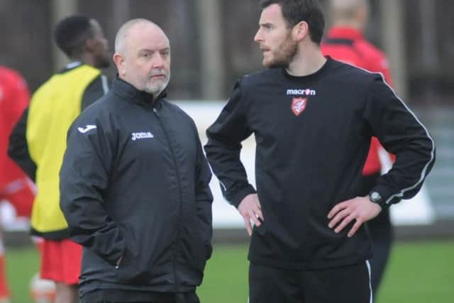 Steve Kittrick, left, handed Chris Bolder the reins for Saturday's game