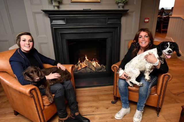 The Farrier - family owners Dani Bushby with mum Suzie Bushby and their dogs in the lounge area