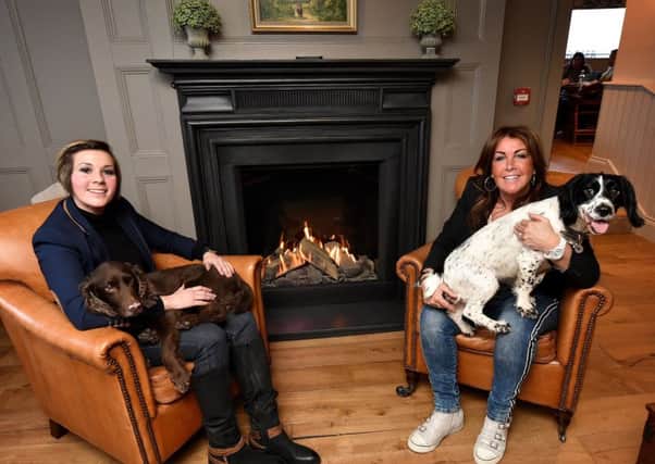 The Farrier - family owners Dani Bushby with mum Suzie Bushby and their dogs in the lounge area