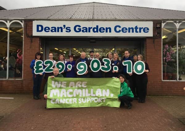 Dean's Garden Centre and MacMillan Cancer Support stuff jubilant with the sum raised.