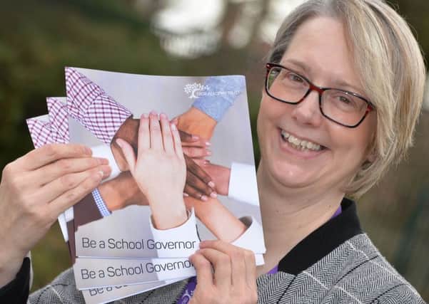 Trish Thistlewood, Governance Manager with Ebor Academy Trust, and the Be a Governor leaflet to encourage people to be a school governor at Braeburn Primary and Nursery Academy.