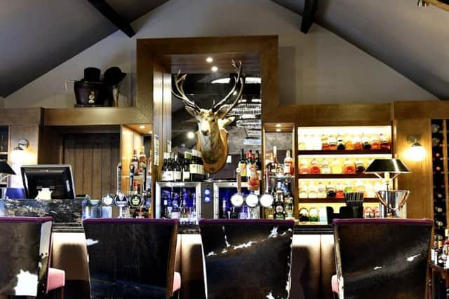 An upstairs lounge sells beers and cocktails in the evening