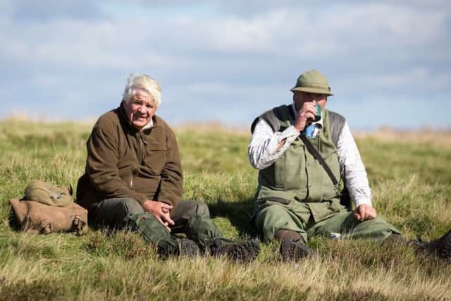 John Dent (left), Rosedale resident who has benefited from employment through grouse shooting and Pete Richardson (right), employed estate farmer who is always out on a shoot day.