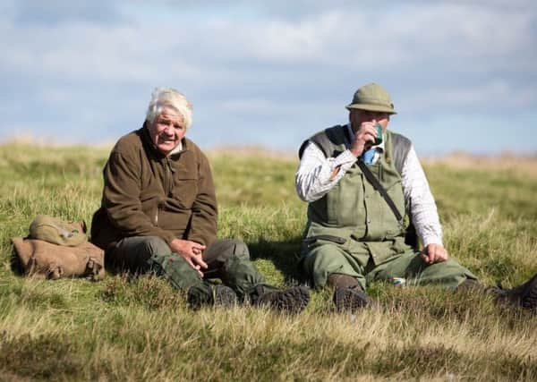 John Dent (left), Rosedale resident who has benefited from employment through grouse shooting and Pete Richardson (right), employed estate farmer who is always out on a shoot day.