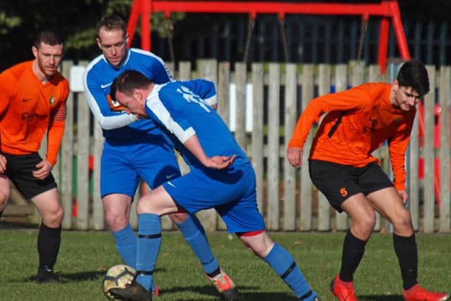 Ayton's Ian Laing pushes forward in their cup semi loss at home to Edgehill