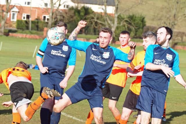 Rosette look to win the ball
