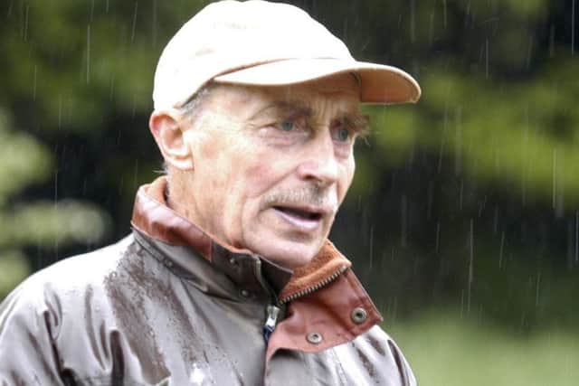 Peter Robinson, pictured here leading a butterfly ramble, has died aged 83