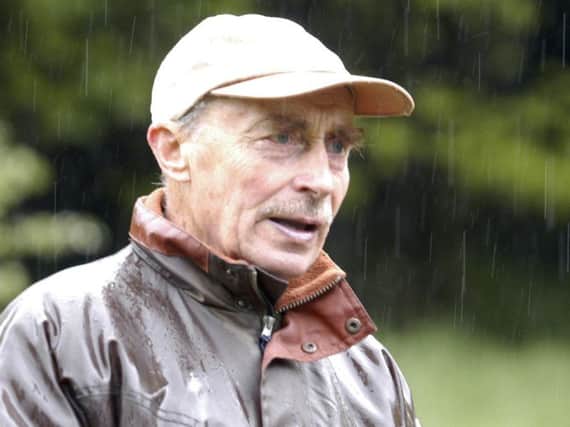 Peter Robinson, pictured here leading a butterfly ramble, has died aged 83