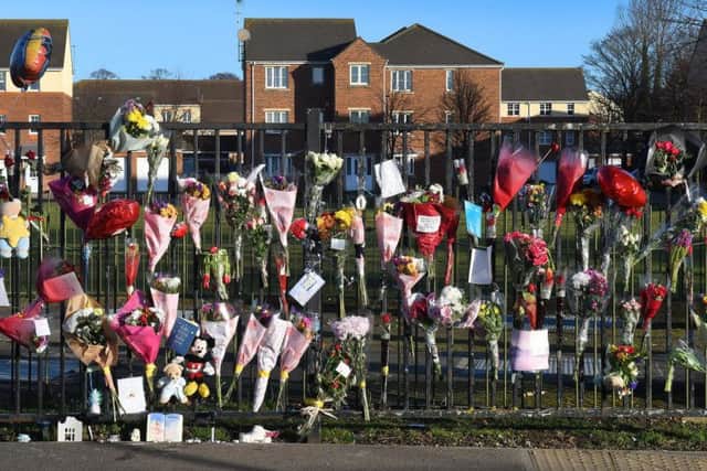 Tributes to Taylor Tolley in Brett Street.