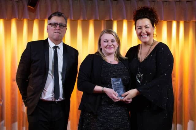 Winner Hannah Hugill from Grosvenor Casino Scarborough gets up on stage to receive her award.