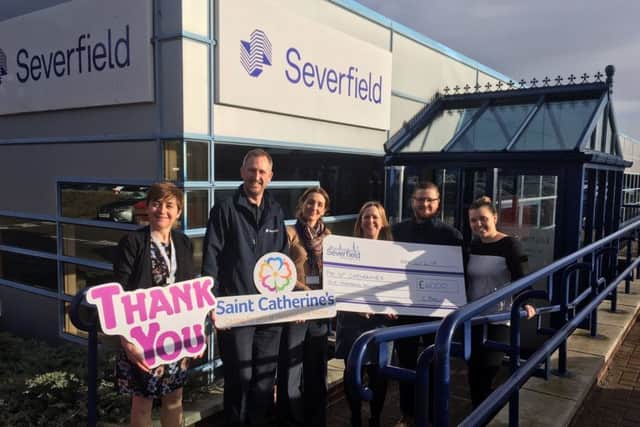 Pictured are fundraiser Nicky Grunwell, Chris Burns, Jenny Wilkie, Cat Bell, Craig Baker and Kate Starkie.
