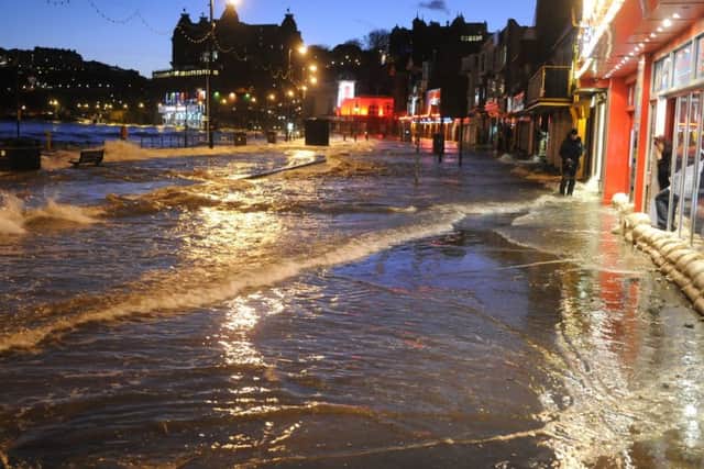 Flooding on Scarborough's South Bay caused by a tidal surge and a spring tide combining.
