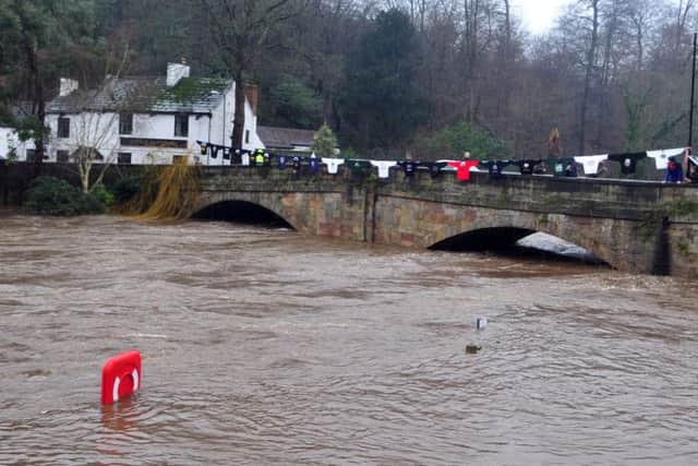 River Nidd in flood at Low Bridge Knaresborough. Flooding after heavy rain affected most of Yorkshire on Boxing Day 2015.  Picture Tony Johnson