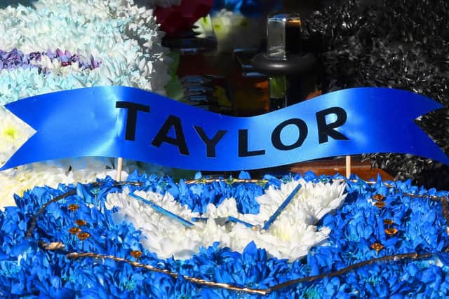 One of the floral tributes to Taylor Tolley