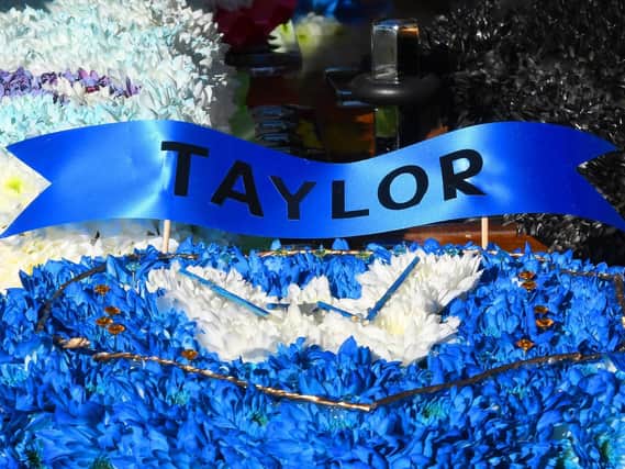 One of the floral tributes to Taylor Tolley