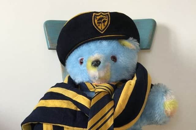 Teddy bear with Scarborough Girls' High School beret, scrarf and tie.