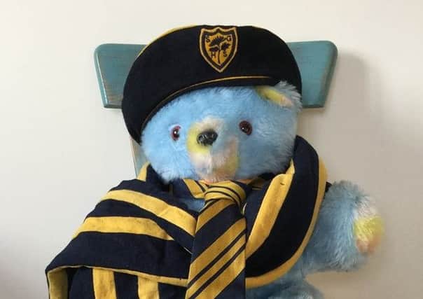 Teddy bear with Scarborough Girls' High School beret, scrarf and tie.