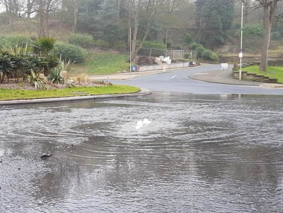 A burst water main is causing flooding on Valley Road.