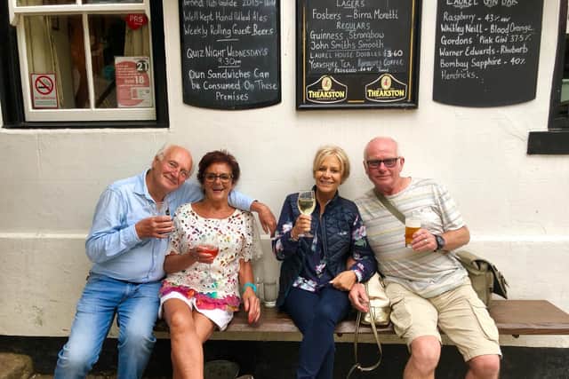 Steve on the right, and, from left, his brother-in-law Michael, Steves wife Diane, and Michaels daughter Debbie outside The Laurel Inn in Robin Hoods Bay on a previous visit