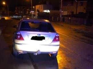 Police have stopped a car in Cayton.