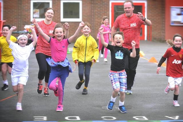 Newby and Scalby School Head Chris Knowles, pictured here at a Sport Relief fundraiser racing the pupils.
pic Richard Ponter 161116a