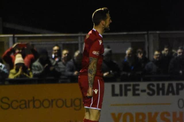 Wayne Brooksby celebrates his spot-kick