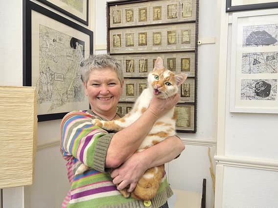 Helen Birmingham with her cat Dr Johnson