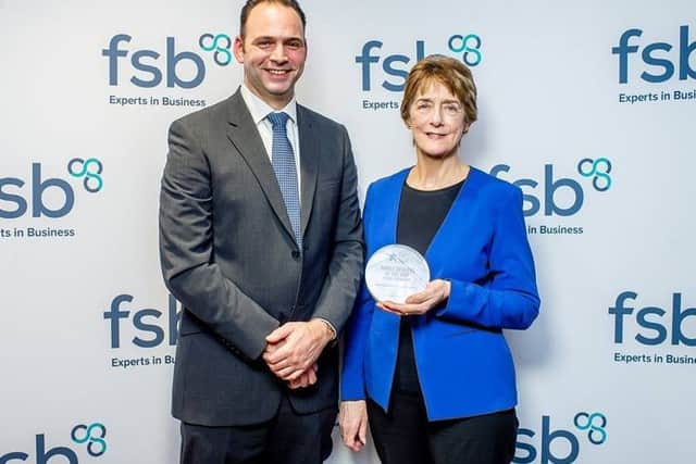Stuart and Carol Fusco with the FSB award.