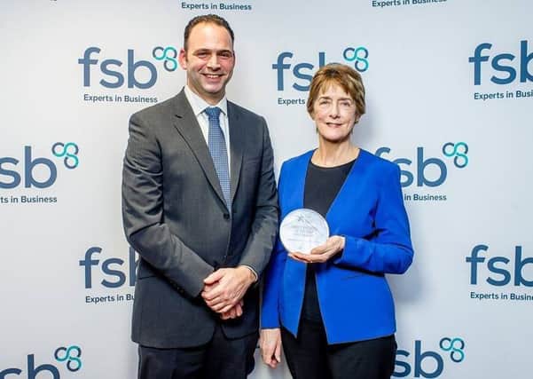 Stuart and Carol Fusco with the FSB award.