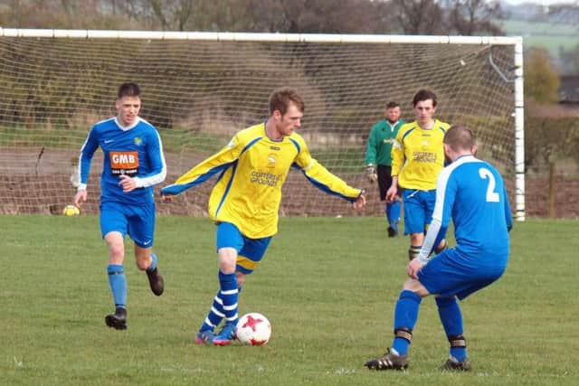 Eastfield Town on the ball against Ayton. Picture by Steve Lilly.